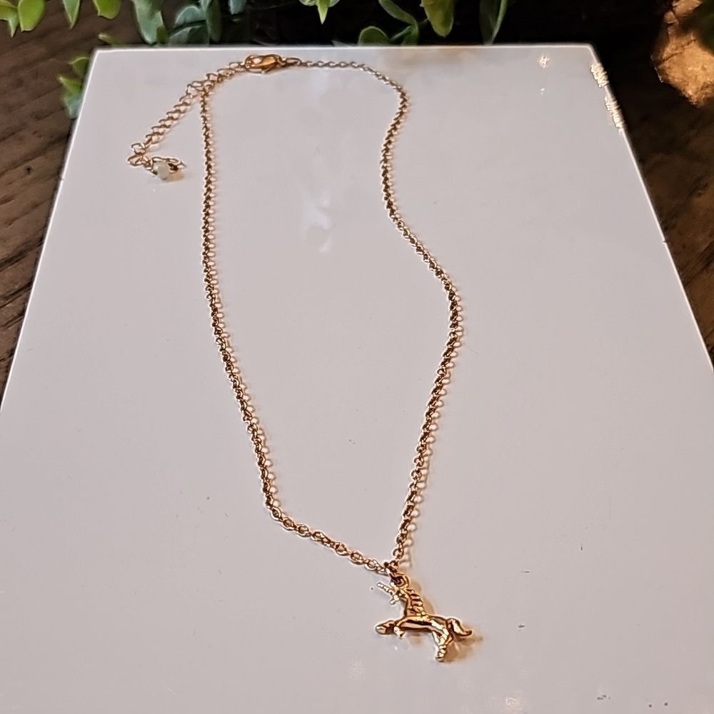 Gold unicorn pendant necklace adjustable new never worn